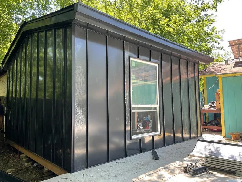 Black standing seam metal wall panels for Metal Roof Installation in Rockcreek