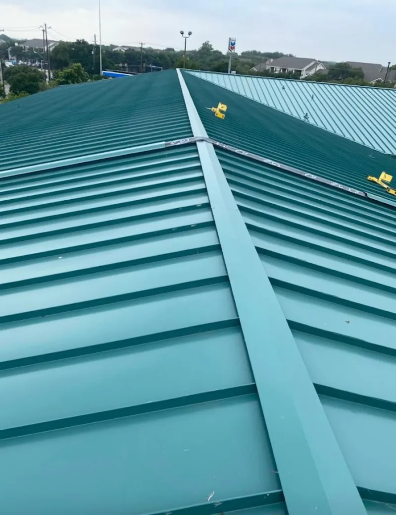 Green commercial metal roof ridge and valley for Metal Roof Repair in Rockcreek