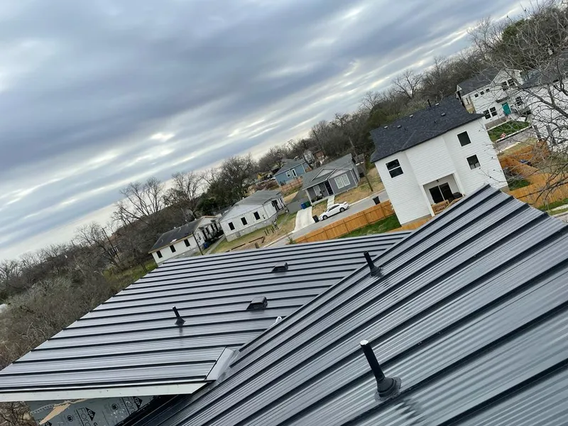Standing seam metal roof panels with vents for Skylight Repair in Rockcreek